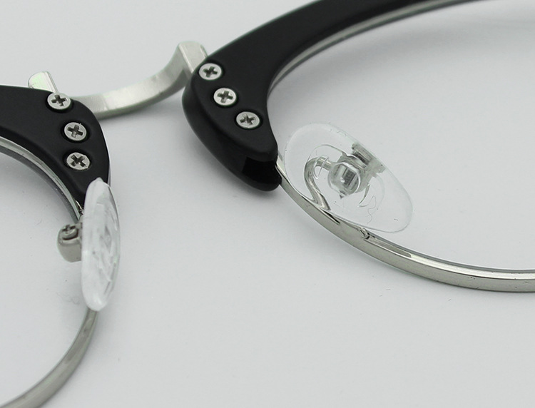 A detailed diagram showing the exploded view of a pair of sunglasses with all parts labeled.