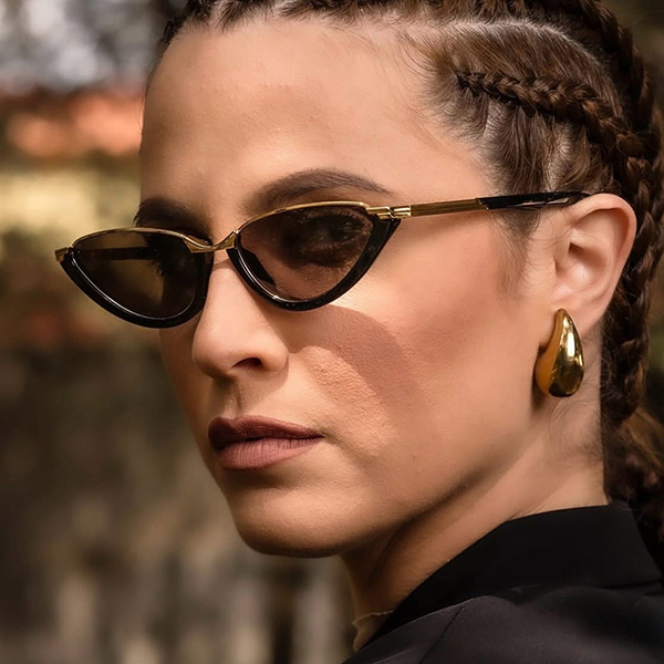 A close-up shot of high-quality sunglasses hinges and lens material