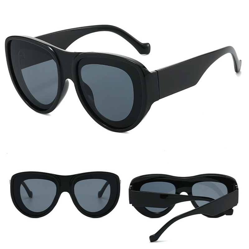 Close-up of the lightweight PC frame and lenses on oversized sunglasses
