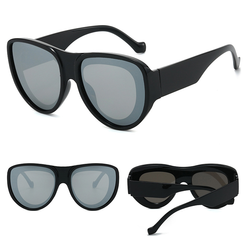 Multiple models with different face shapes all wearing the oversized sunglasses well