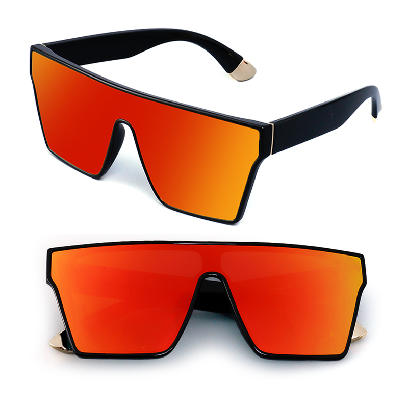 a stylish model wearing the large-frame sunglasses outdoors