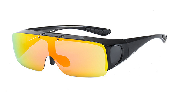 Person wearing wrap-around sunglasses while cycling