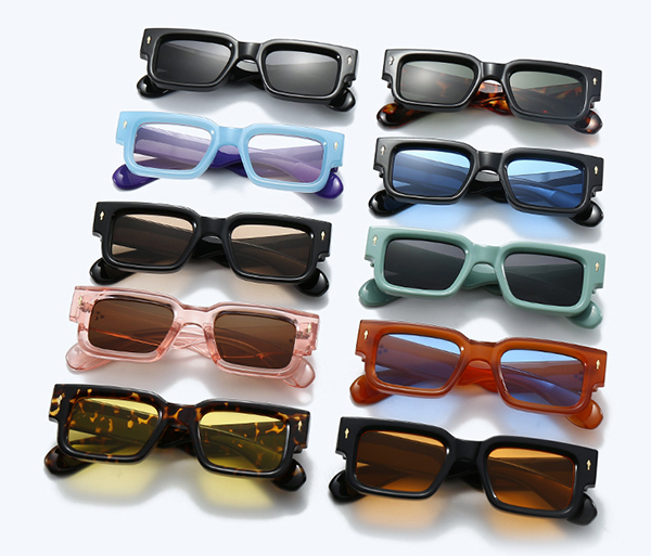 an assembly line in a clean and modern sunglasses factory