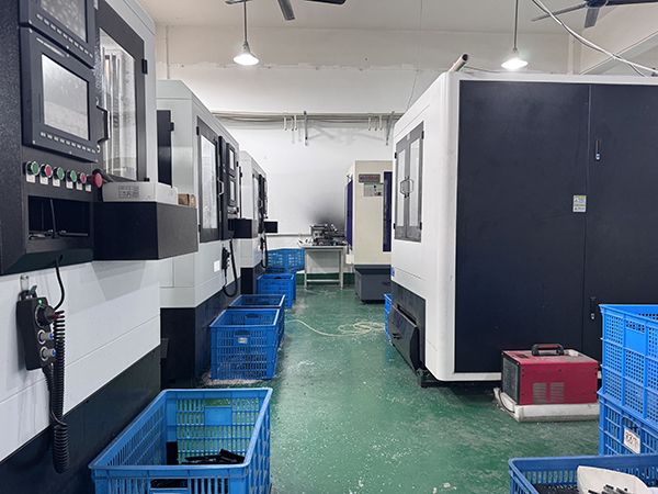 A modern eyewear manufacturing factory with various machines.