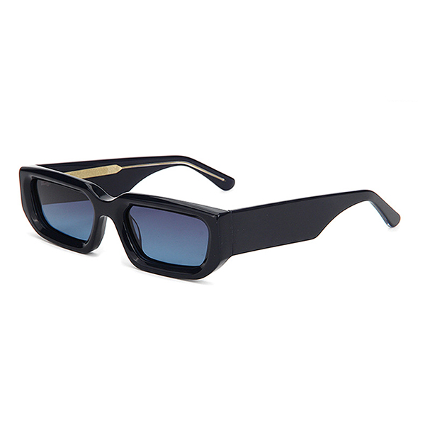 A woman comfortably wearing the edgy punk sunglasses for her daily outing.