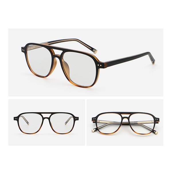 A man and a woman both wearing the same style of unisex double bridge glasses